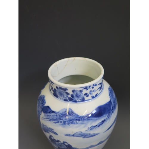 1665 - A 19th century Chinese vase of ovoid form with blue and white decoration of figures seated in a gard... 