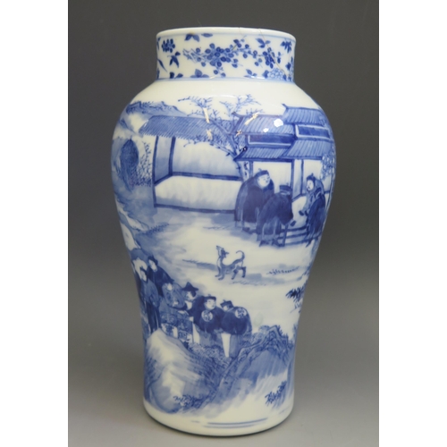 1665 - A 19th century Chinese vase of ovoid form with blue and white decoration of figures seated in a gard... 