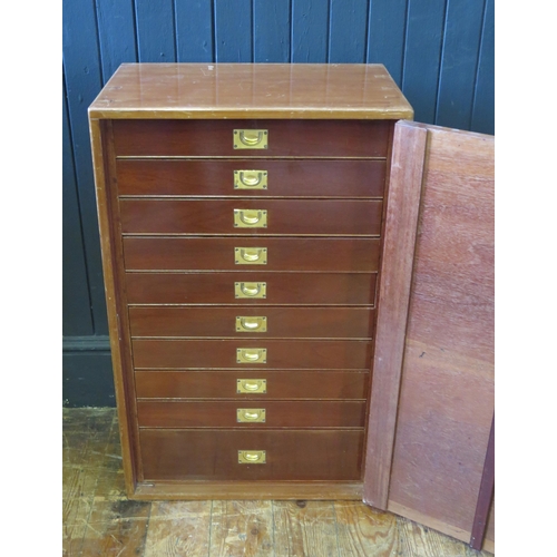 1683 - A mahogany collector's cabinet, of rectangular outline, the plain field door enclosing ten short dra... 