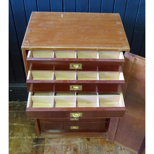 1683 - A mahogany collector's cabinet, of rectangular outline, the plain field door enclosing ten short dra... 