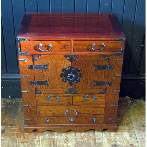 1688 - An Oriental polished hardwood and metal bound small chest, with an arrangement of four short and one... 