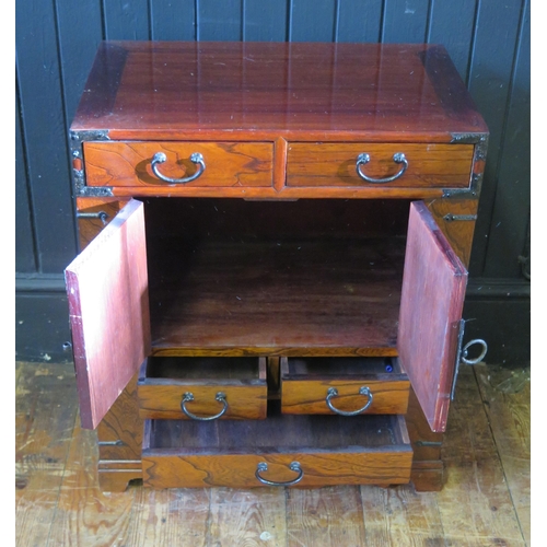 1688 - An Oriental polished hardwood and metal bound small chest, with an arrangement of four short and one... 
