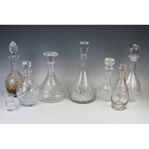 1869 - A cut glass ships decanter of traditional design, with palmette and hobnail decoration, together wit... 