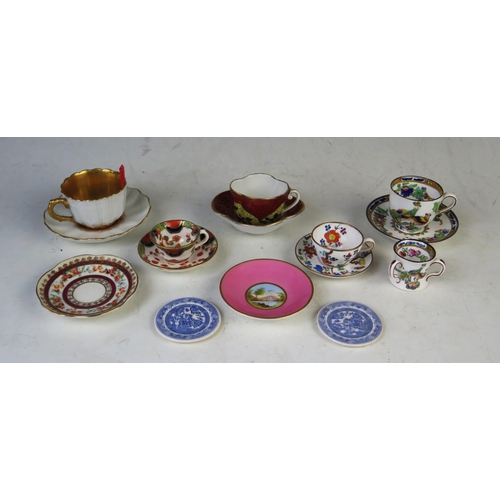 1874 - A collection of German porcelain cabinet cups and saucers, vase and plate, together with assorted En... 