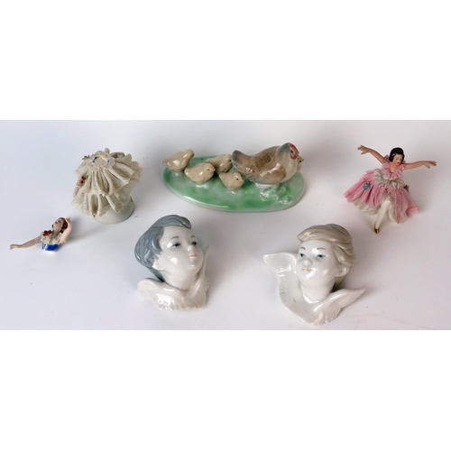 1888 - Two LLadro porcelain wall faces of winged children, two crinoline dressed ballerinas, and a chicken ... 