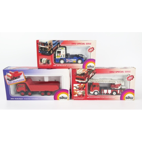 2417 - Siku Truck Trio - (1) 2923 Mercedes Dumper Truck, (2) 2581 DAF Racing Truck, (3) 3780 Mercedes Fire ... 