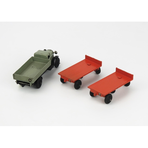 2437 - Dinky 25e Tipping Wagon (Type 3) - stone colour, black ridged hubs and chassis, 