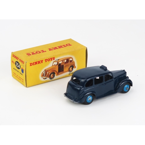 2447 - Dinky 40H / 254 Austin FX3 Taxi - dark blue body, light blue ridged hubs, matt black baseplate with ... 