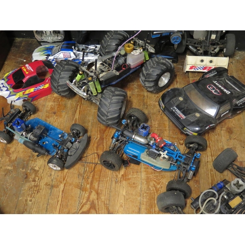 2594 - Group of Remote Control Cars including Kyosho, Electronix and parts