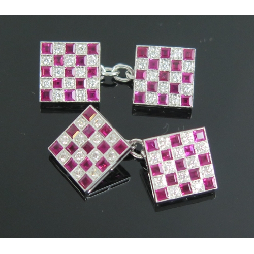 723 - A Pair of Ruby and Diamond Cufflinks in unmarked precious white metal setting, boxed, 7.8g