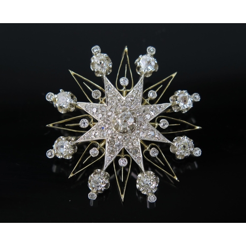 726 - A Large Victorian Diamond Star Brooch Pendant in an unmarked high carat gold setting, set with old c... 