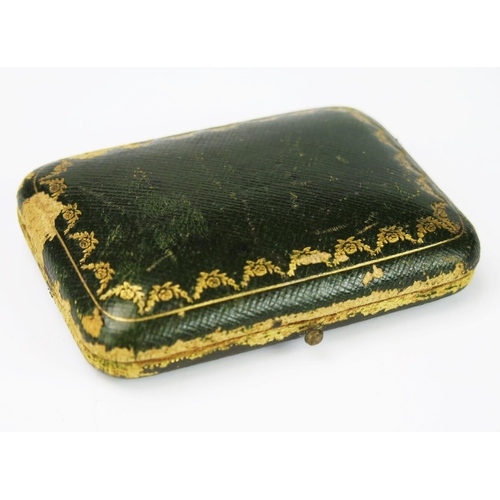 776 - An Antique Green Cartier Jewellery Box, with silk and velvet interior, 9x6.5cm.