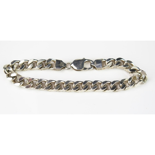 797 - A Silver Gent's Curb Link Bracelet, flat curb link, 21.5mm long including clasp.