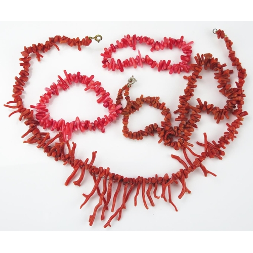 829 - An Orange Coral Necklace, long and short strands of coral together with another with short strands a... 