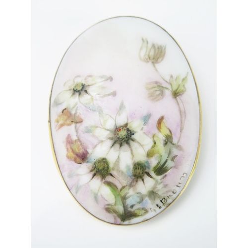 846 - An Antique Porcelain and 9ct Gold Brooch Signed, the oval porcelain plaque held in a gold mount, 68x... 