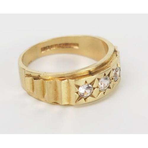 858 - A 9ct Gold and White Stone Ring, hallmarked Sheffield, size P.75, 5.2g