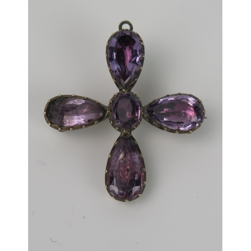 887 - An Antique Foil Backed Cross Pendant Brooch, purple stones, in a silver and gold unmarked mount.