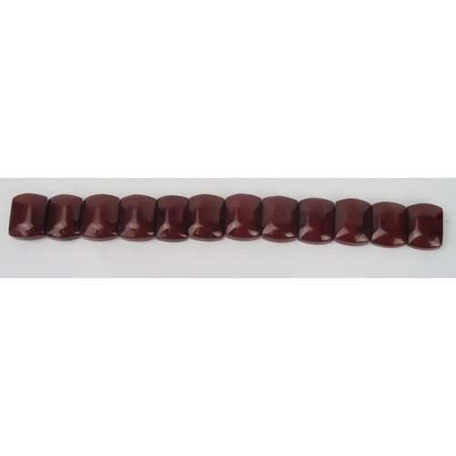 899 - Twelve Faux Cherry Amber Beads Bracelet, 210mm long, 33.2g total.