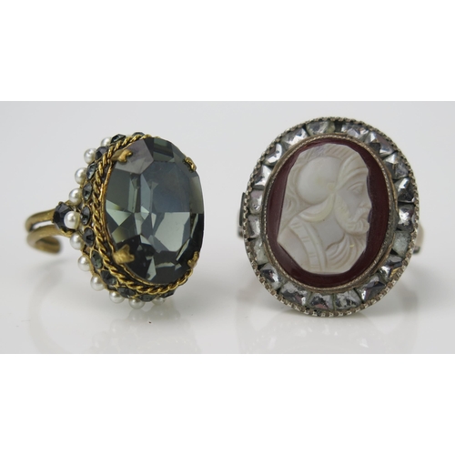 903 - A Carved Cameo Dress Ring, of a classical knight surrounded by foil wrapped white stones, together w... 