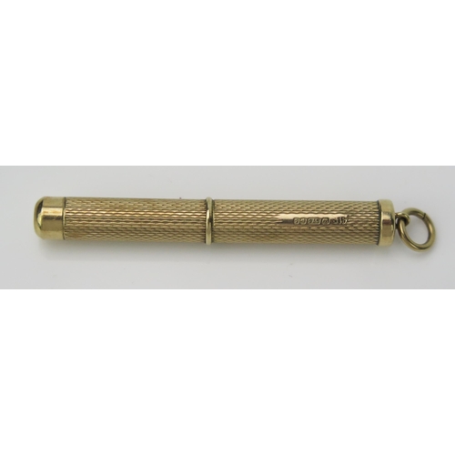 904 - A 9ct Gold Tooth Pick, with engine turned decoration, 5.5cm long 6.7g.