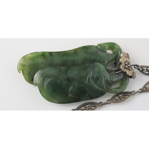 906 - A Chinese Jadeite and Silver Pendant and Chain,  carved as two aubergines / eggplants, on a lozenge ... 