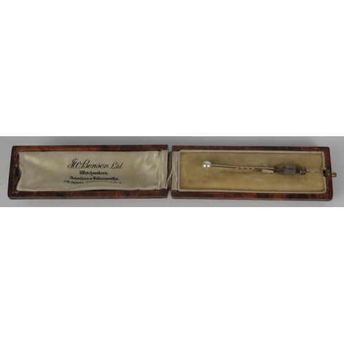 907 - A Gold and Pearl Stick Pin (untested), not marked, with clasp, 63mm, 1.1g total, boxed.