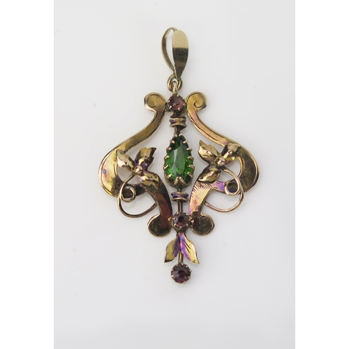 914 - An Art Nouveau 9ct Gold Pendant, the central pear shaped Peridot, above two small Amethyst, hallmark... 