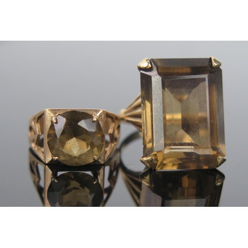 917 - A Smokey Quartz and 9ct Gold Cocktail Ring, the rectangular cushion cut 20x15mm, hallmarked 9ct, rin... 