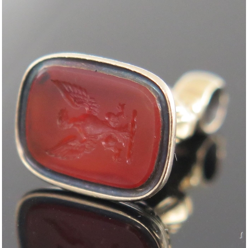 935 - An Antique Carnelian Fob Seal, the seal engraved with an eagle with wings out spread, unmarked gold,... 