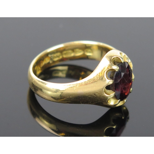 947 - An Antique 18ct Gold and Garnet Gentleman's Ring, stamped, ring size V, 10x8mm stone, 10.7g, Chester... 