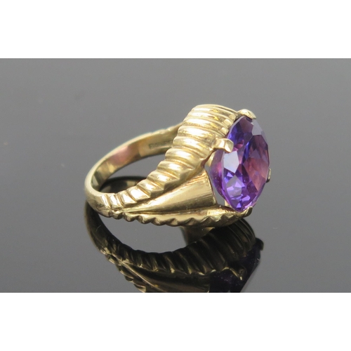 959 - An Amethyst and 9ct Gold Cocktail Ring, stone 14x12mm approximately, ring size L/M, 8.3g.