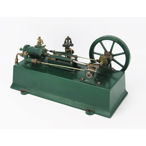 2589 - A Live Steam Plant, with single cylinder with spoked flywheel, painted in bottle green with rectangu... 