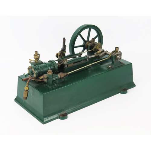 2589 - A Live Steam Plant, with single cylinder with spoked flywheel, painted in bottle green with rectangu... 