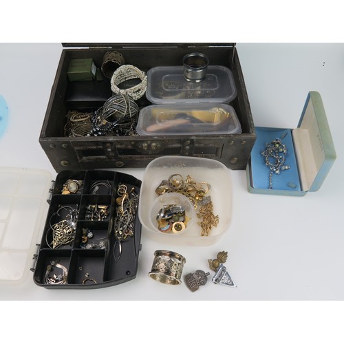 791A - A Case of Costume Jewellery, silver napkin ring, silver A.R.P. badge, etc.