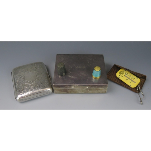 683 - A silver cigarette box, all marks worn, a silver thimble, spring scale and a plated cigarette case.