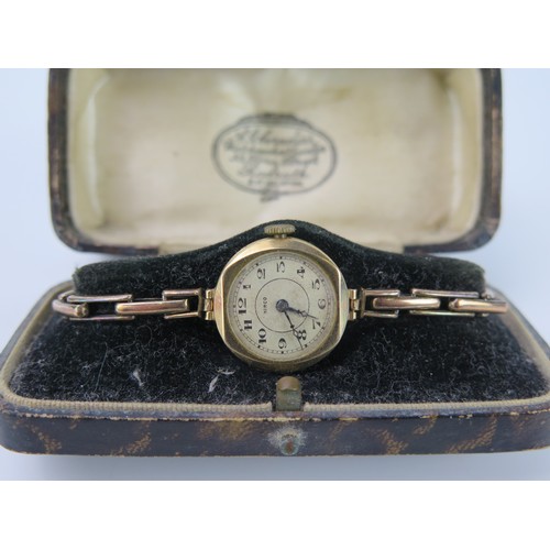 475 - A Hirco Ladies 9ct gold cased wristwatch, on an expandable 9ct gilt on silver strap, together with a... 