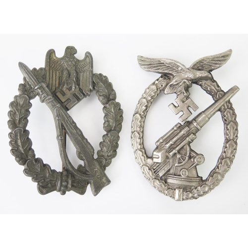 1010 - A German Anti-Aircraft War Badge, unmarked, together with an Infantry Assault Badge. (2).