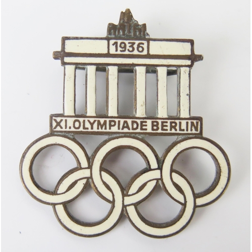 1012 - A Third Reich period 1936 Olympic Visitor's Badge, with enamel decoration, stamped to the reverse Pa... 