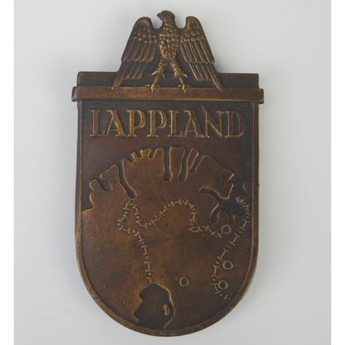 1017 - A Third Reich period Lappland Shield, stamped decoration.