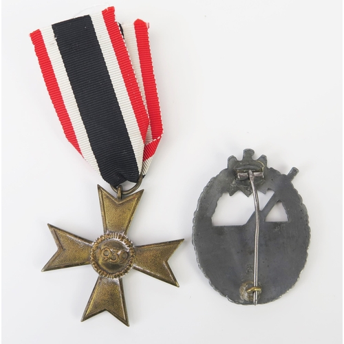 1021 - A Third Reich period War Merit Cross 2nd Class with ribbon, together with a Coastal Artillery War Ba... 