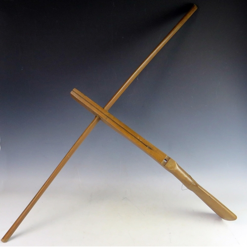 1032 - A Vietnamese wood cross bow, 73cm long.