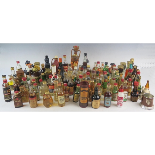 1034 - An extensive selection of assorted miniature spirits and liqueurs.