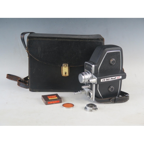 1038 - A G.B. Bell & Howell 627, 16mm cine camera, contained in a fitted stitched leather case.