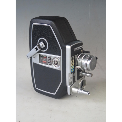 1038 - A G.B. Bell & Howell 627, 16mm cine camera, contained in a fitted stitched leather case.