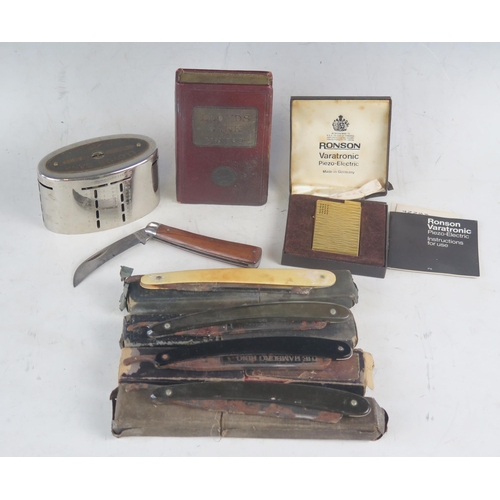 1040 - A collection of assorted savings banks, penknife and assorted razors.