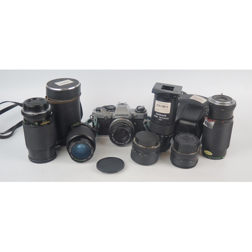 1043 - An Olympus CM10 35mm camera, with Suiko MC Auto-S 1:1.8 f=50mm lens, together with six other assorte... 