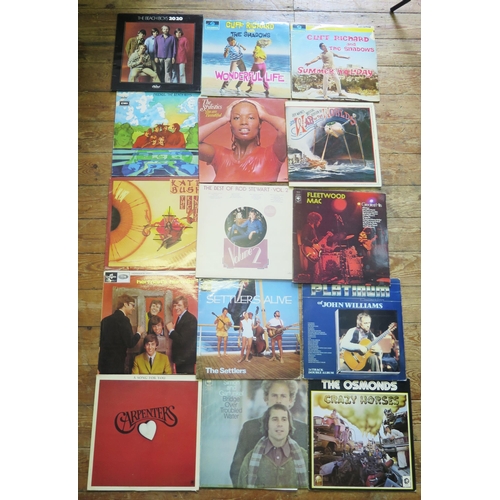 1044 - A collection of 33RPM records including the Beatles, jazz artists including Brubeck, Miles Davis, Os... 