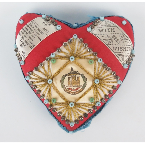 1052 - A late 19th/early 20th century Dorsetshire Regiment valentine cushion, with printed silk regimental ... 