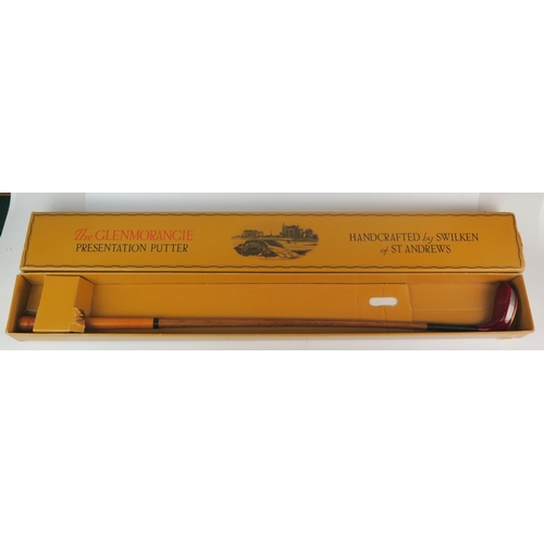 1070 - A Glenmorangie hickory shafted presentation putter, in original card box.
Provenance:- presented  to... 