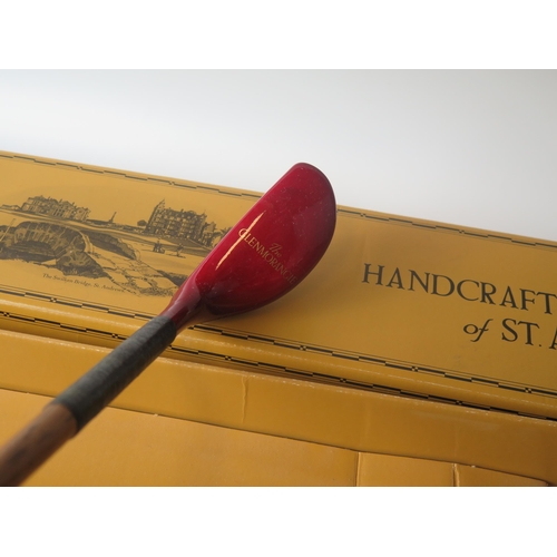 1070 - A Glenmorangie hickory shafted presentation putter, in original card box.
Provenance:- presented  to... 